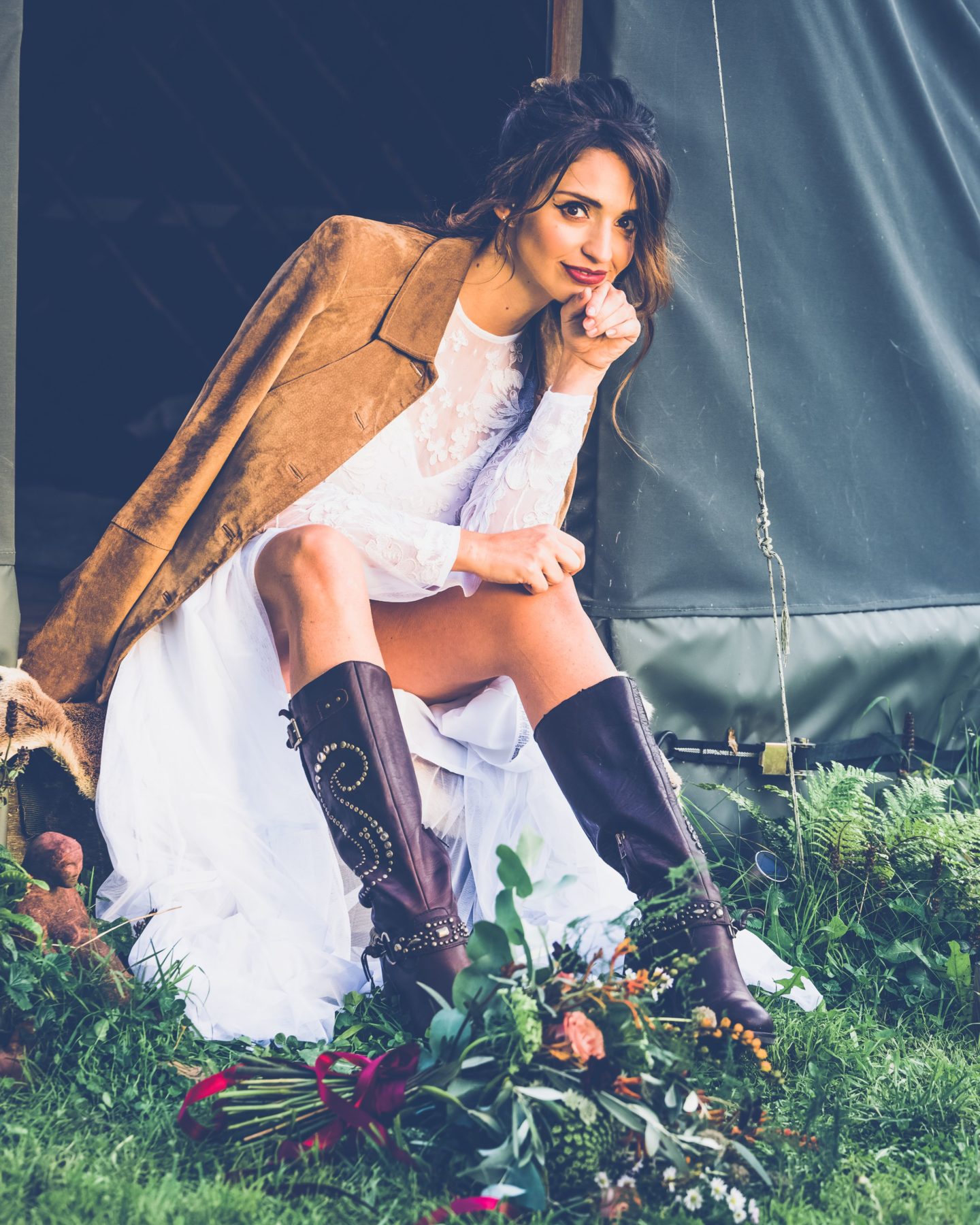 1970s Bohemian Bridal Inspiration With Field Flower Bouquets Cowboy Boots and Suede Jackets 