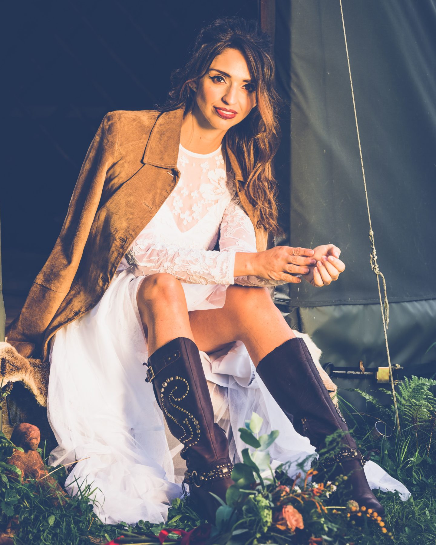 1970s Bohemian Bridal Inspiration With Field Flower Bouquets Cowboy Boots and Suede Jackets 