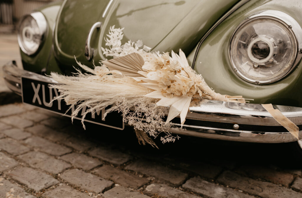 City Elopement With Bridal Jumpsuit and Vintage Wedding Car In Guildhall, Bath