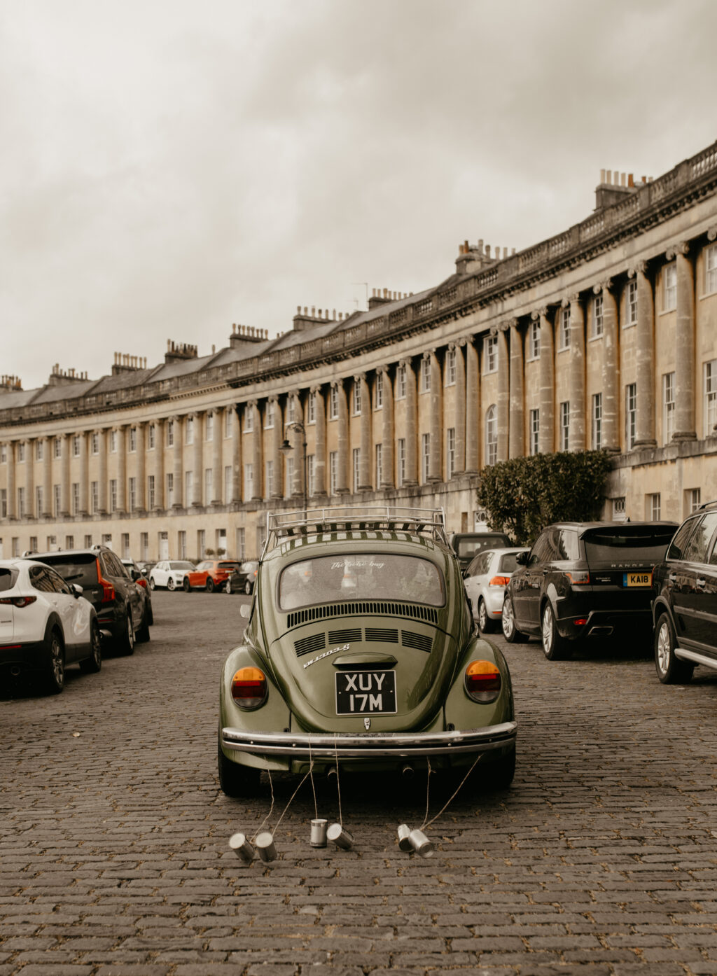 City Elopement With Bridal Jumpsuit and Vintage Wedding Car In Guildhall, Bath