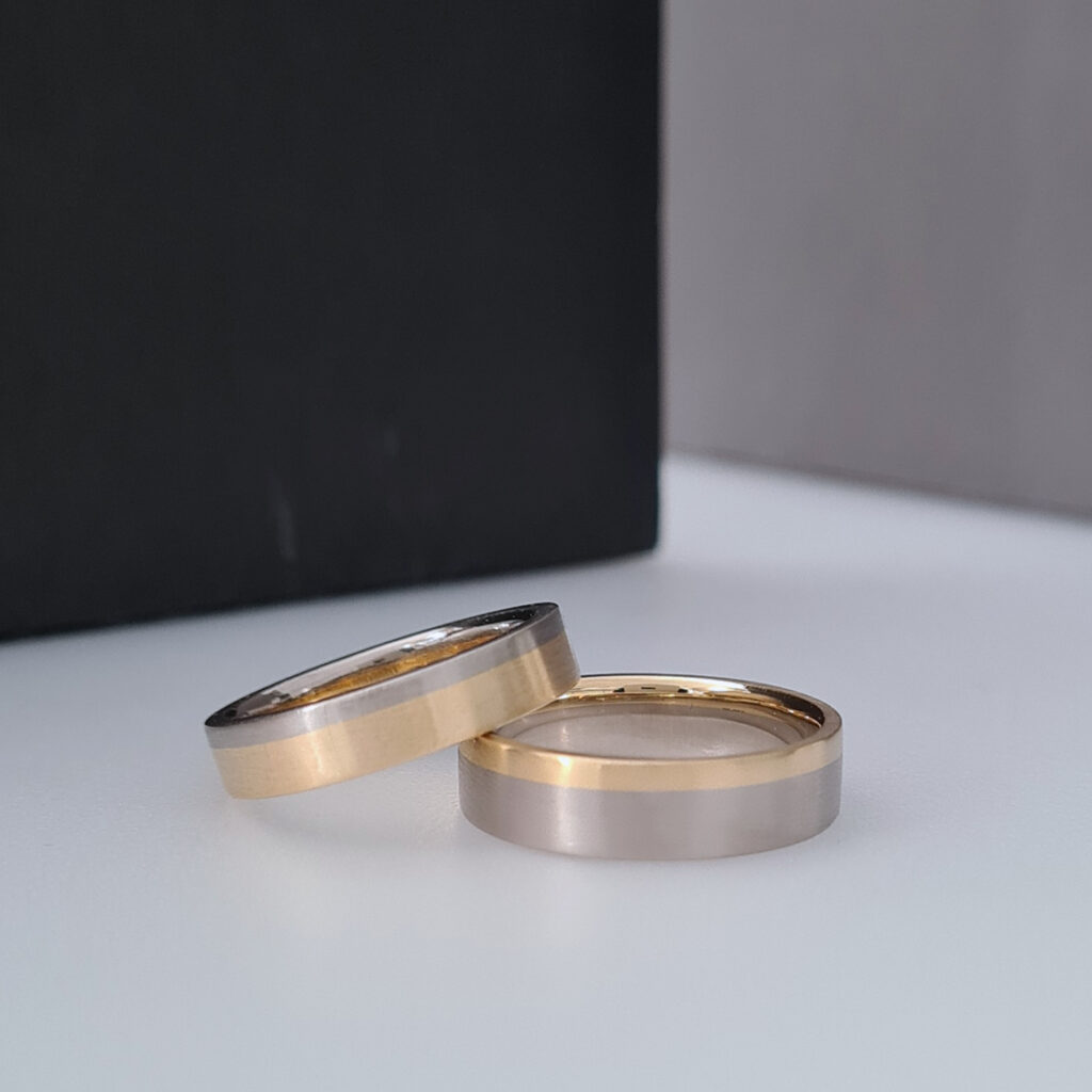 Two-tone wedding rings in Fairtrade Gold.