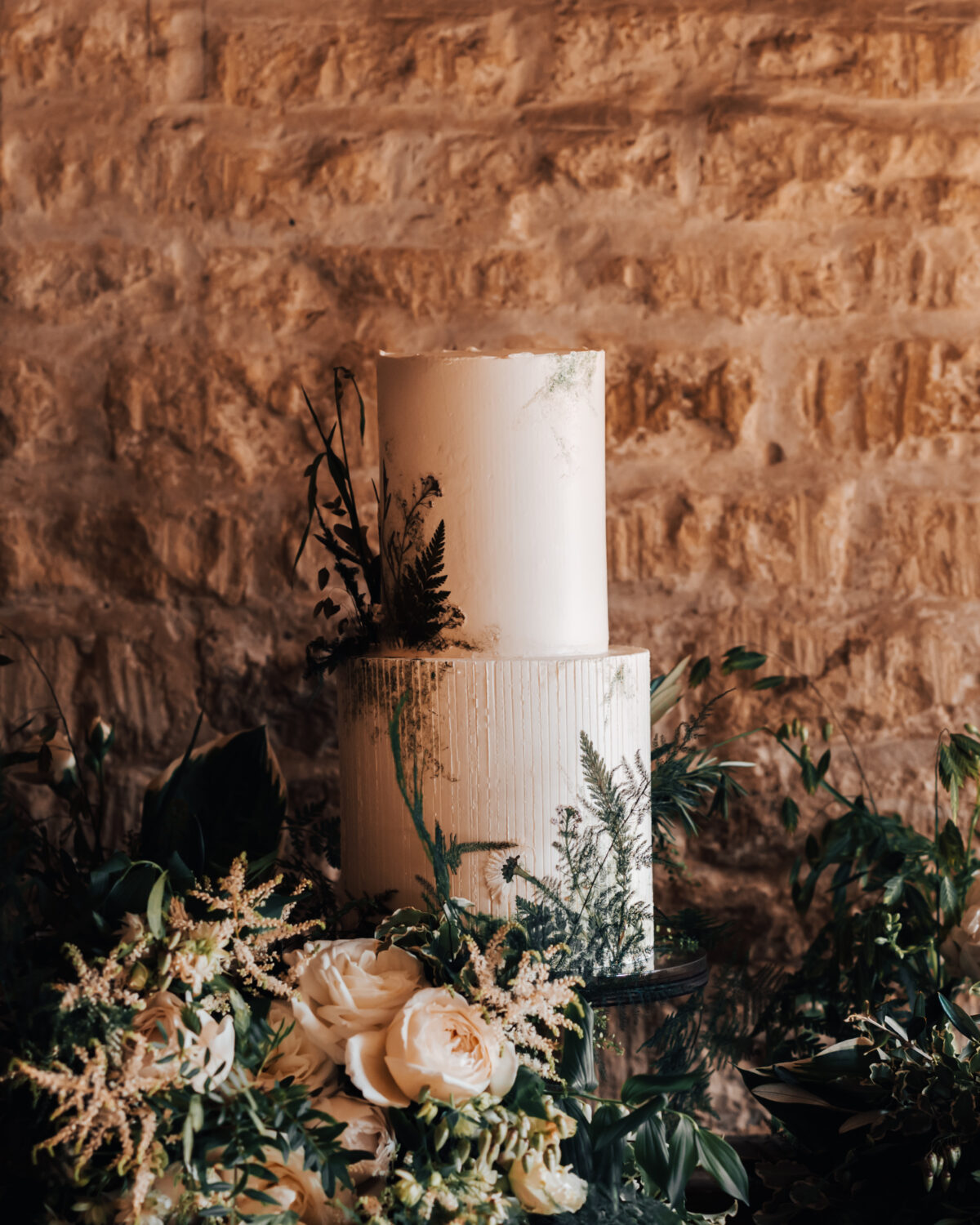 Pressed foliage, botanical cake for Courtney and Dan at Old Gore Barn. Photography by Christophe Bourgeouis