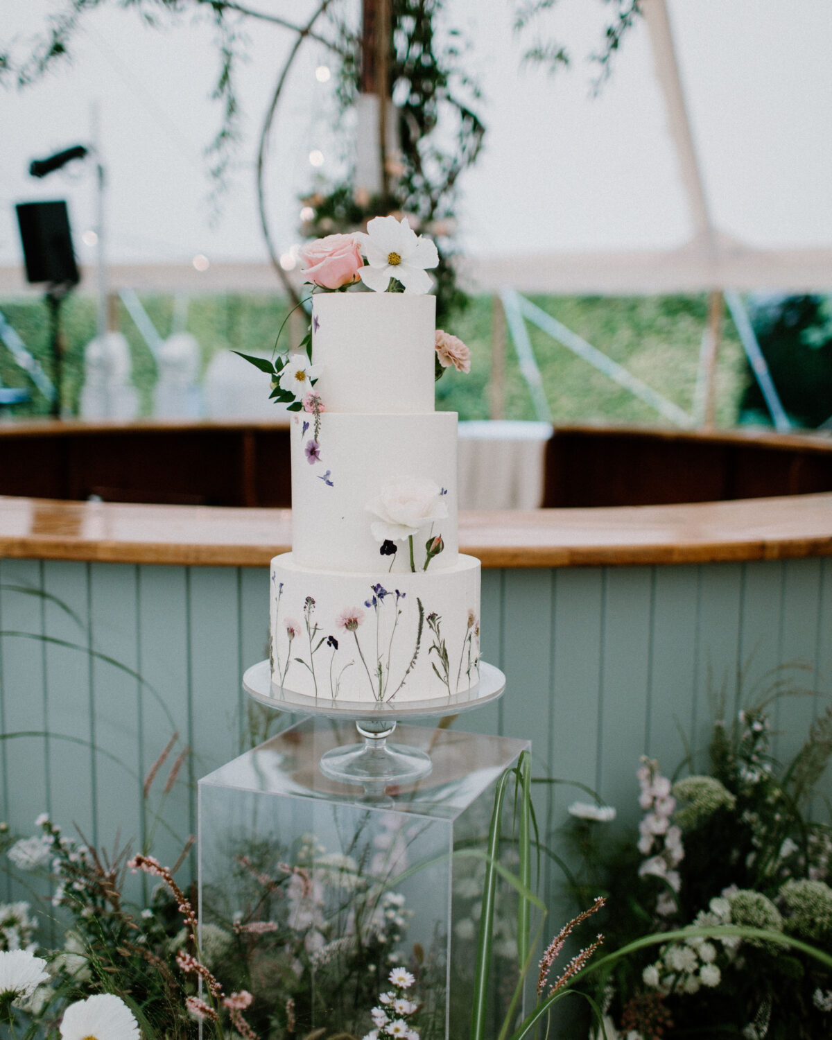Pressed floral, secret garden feels for Emily and Hector. Photography by Nicola Dixon