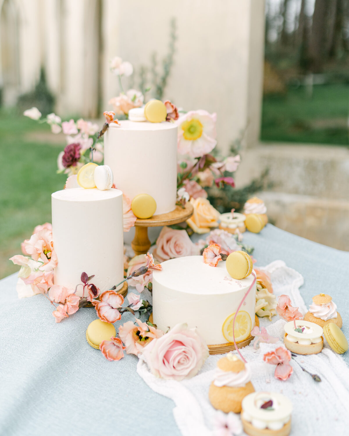 Floral wedding cake trio at Painshill Park. Photography by Sara Cooper Photography