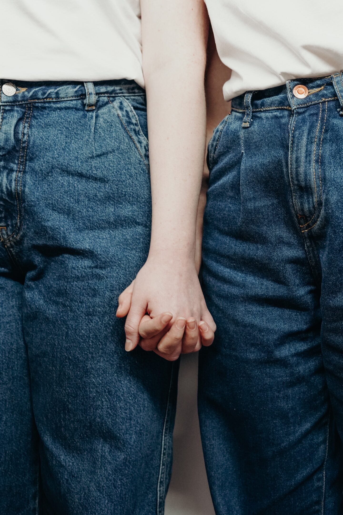 Two Women Holding Hands