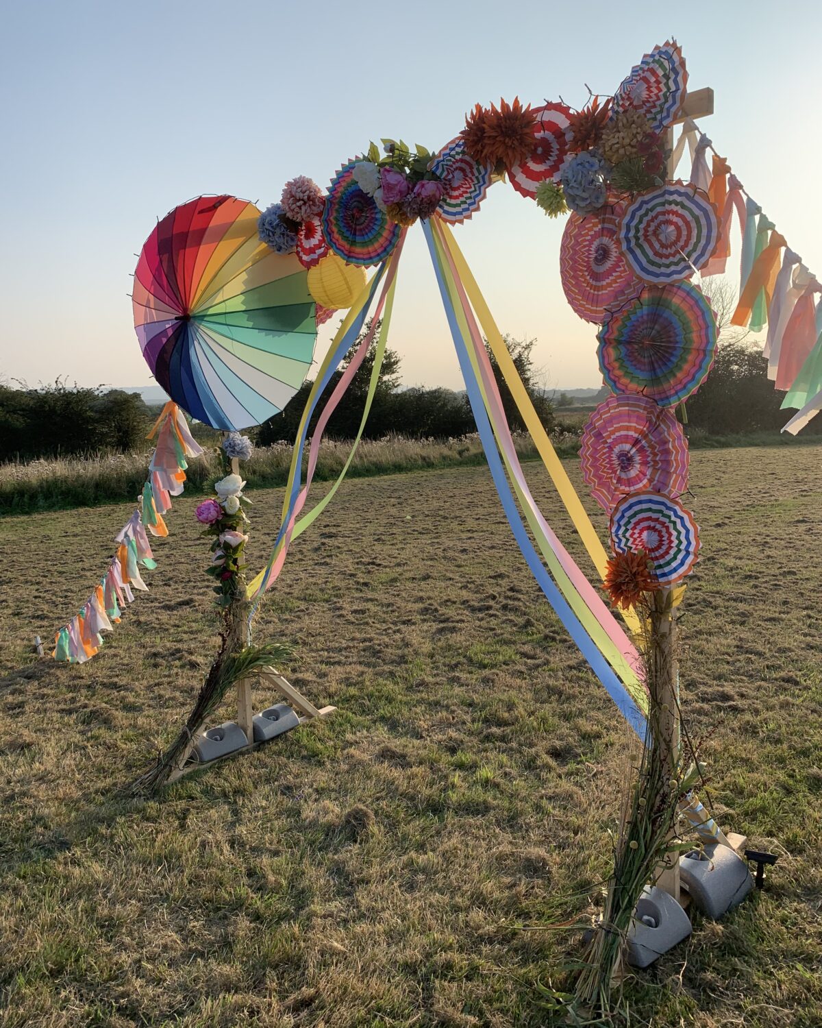 Rainbow ceremony arch for LGBTQ wedding